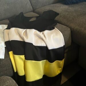 Karin Stevens it’s black white and yellow Dress